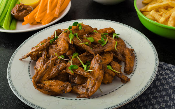 Pairing chicken wings and wine.